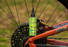 Green Oil lubricant in Berry bottle