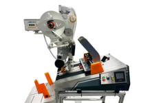 AM Labels adds to offering with automatic packet feeding system AM Labels - Feeder Labeller