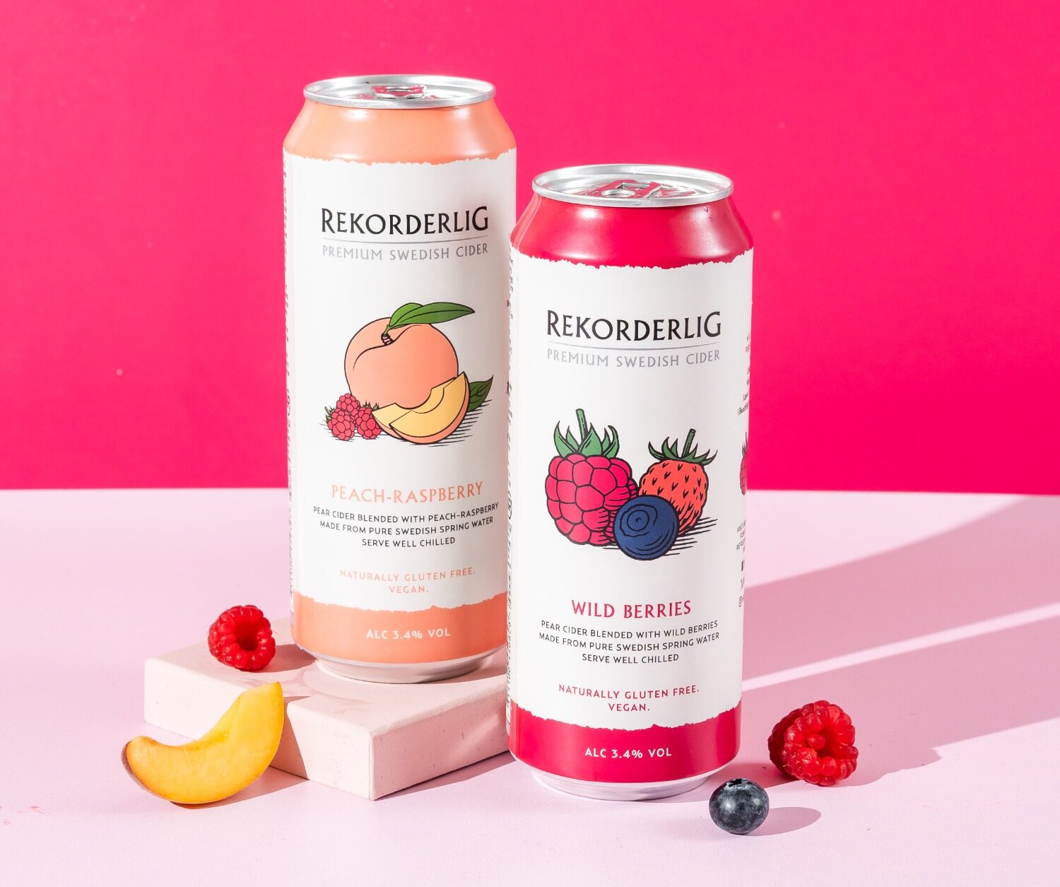 New cider cans on table with fruits