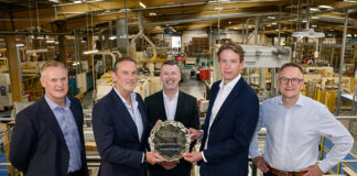 Board 24 receiving its Supplier of the Year award from Macfarlane Packaging