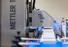 Reducing waste with smart checkweighing solutions Checkweigher - view from the side showing conveyor to sorting station