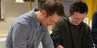 Paul Bynoth talking to a design student at Bath Spa University