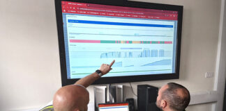 Operatives study packaging machine data
