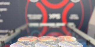 Automated shrink wrapping line