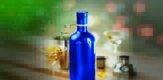 Spirits bottle featuring spray decoration