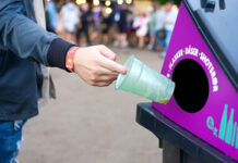 Recyclable cups hit the right note with music festival fans Cups being placed in collection point for recycling