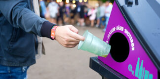 Cups being placed in collection point for recycling