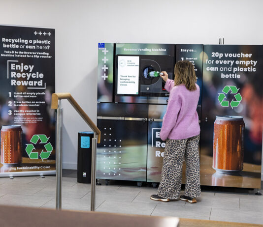 Scottish trial shows small financial incentive can drive surge in recycling Student using a reverse vending machine