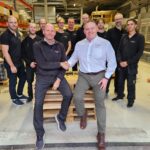 Sverre Stenbom (Left), Darren Chandler (Right), and RobotGrader Team (Back)