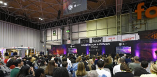 Conference stage with packed audience