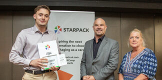 Award being presented to student designer