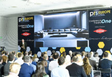 Busy conference session at trade exhibition