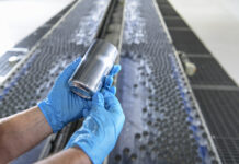 Alupro manifesto aims to help deliver circular aluminium packaging supply chain Worker holding aluminium can