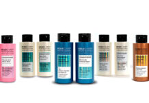 Haircare range with bottles featuring holographic labels