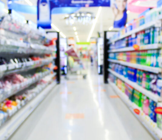 Building FX resilience in the packaging sector Supermarket in blurry background displaying various types of packaging